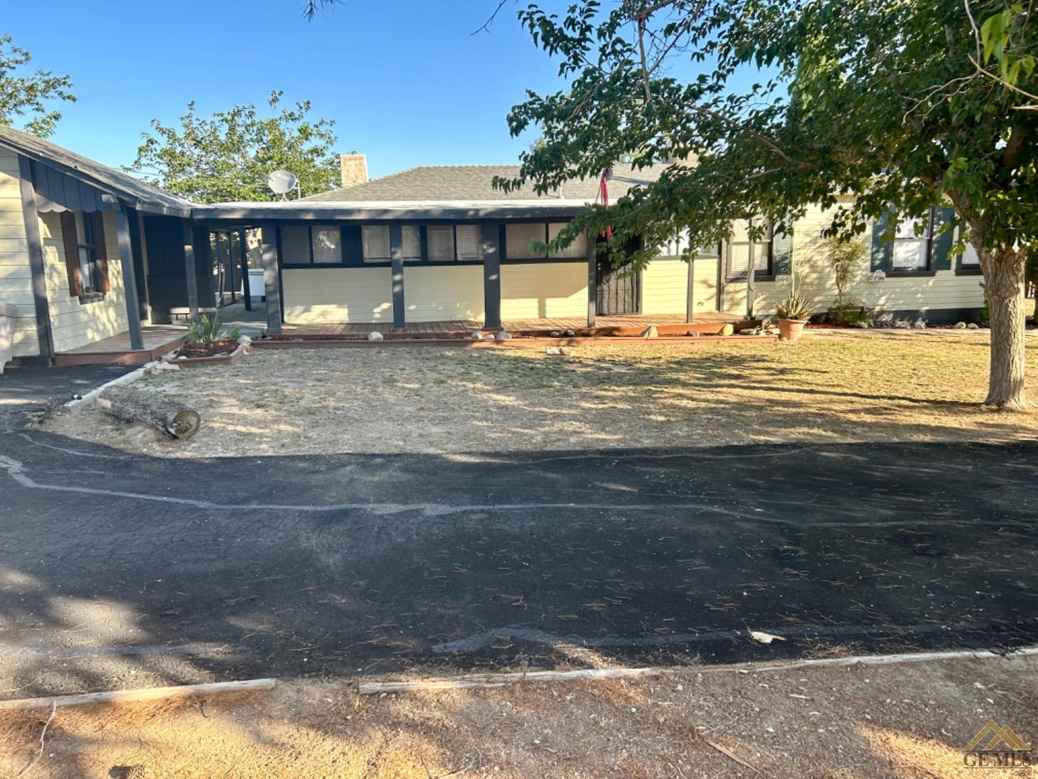 Undisclosed Address Maricopa, CA 93252 - Photo 17 of 32 a view of a house with a yard