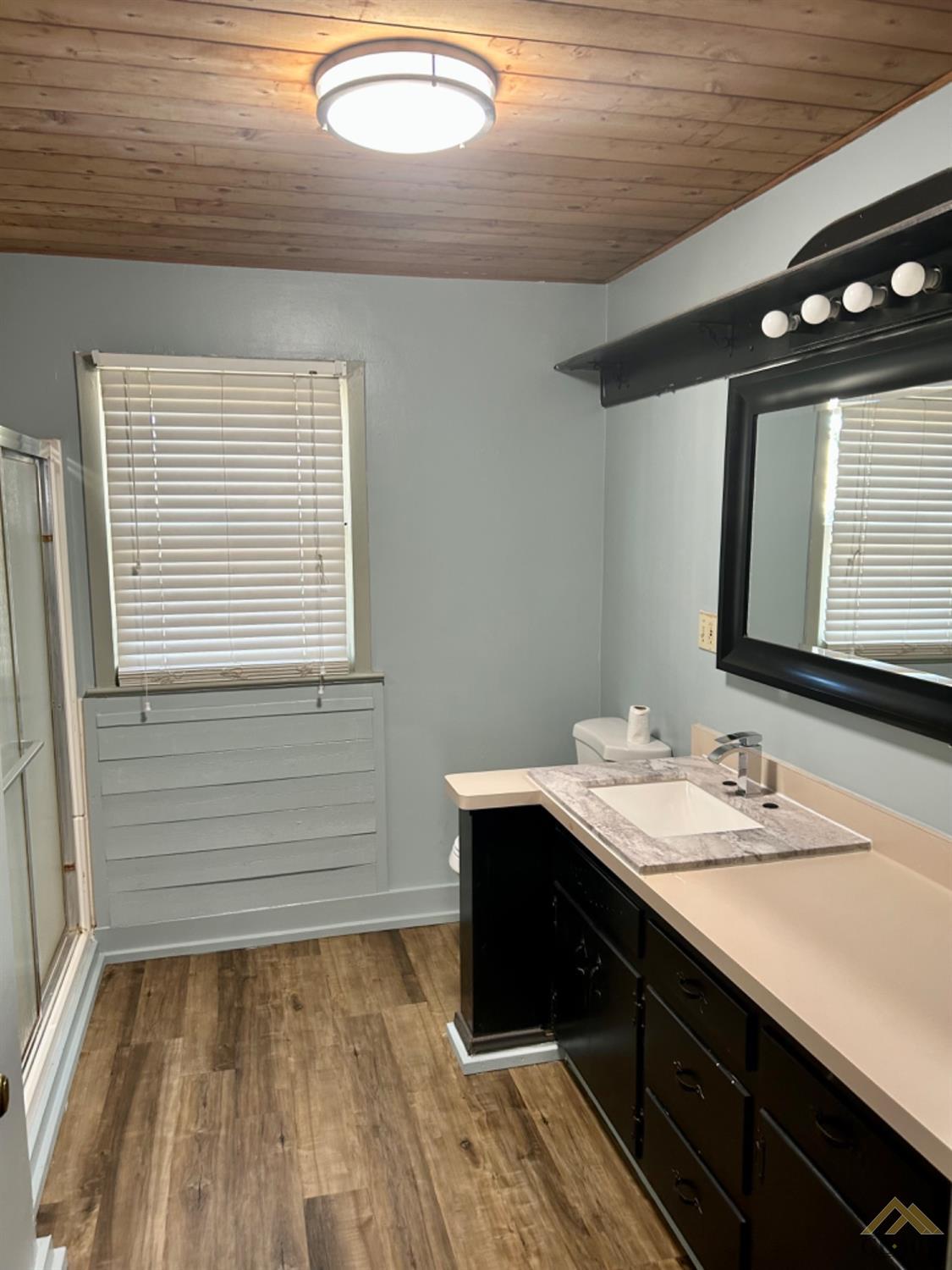 Undisclosed Address Maricopa, CA 93252 - Photo 19 of 32 a bathroom with a sink and a mirror