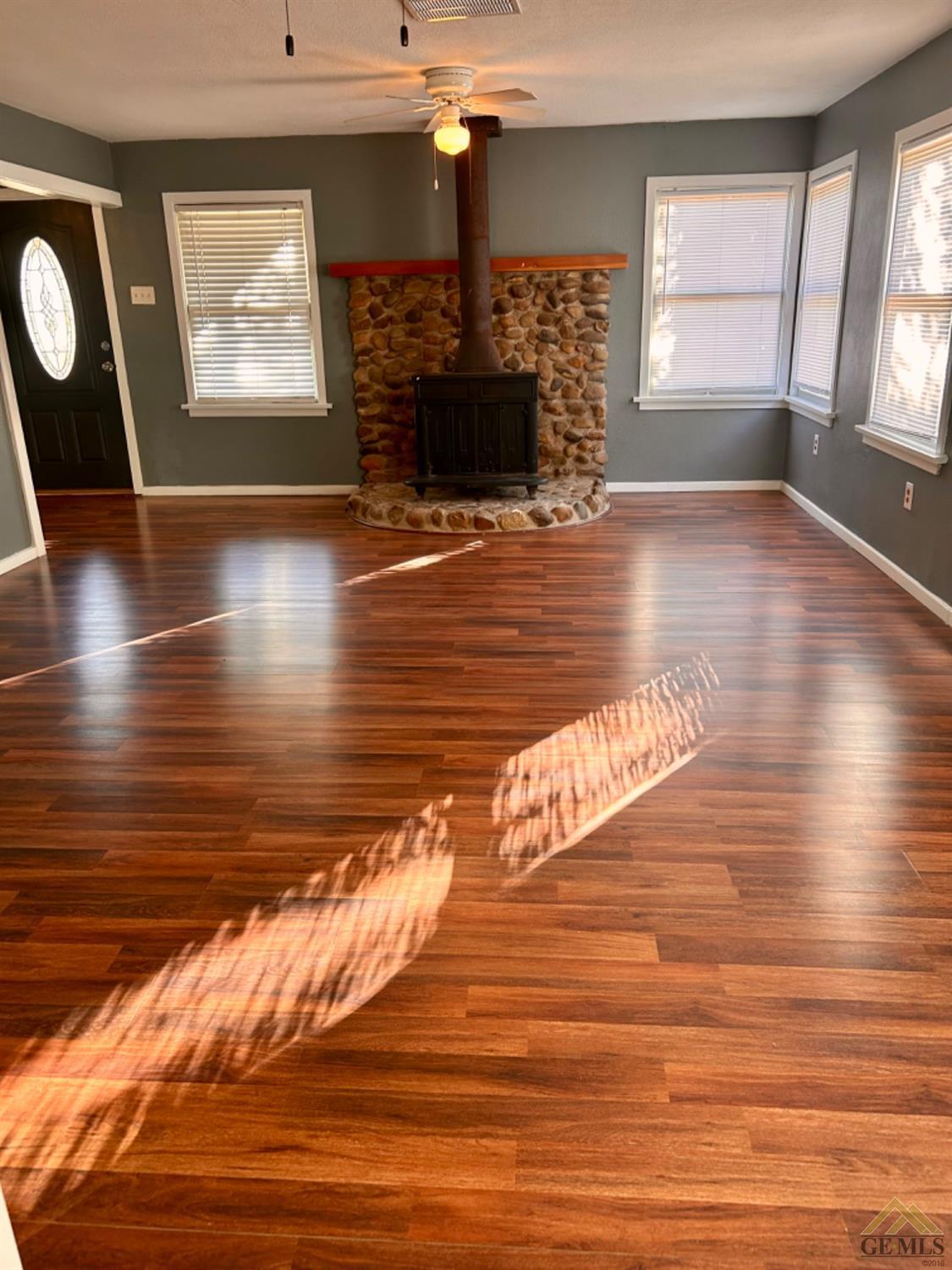 Undisclosed Address Maricopa, CA 93252 - Photo 20 of 32 a view of livingroom with furniture hardwood floor and window
