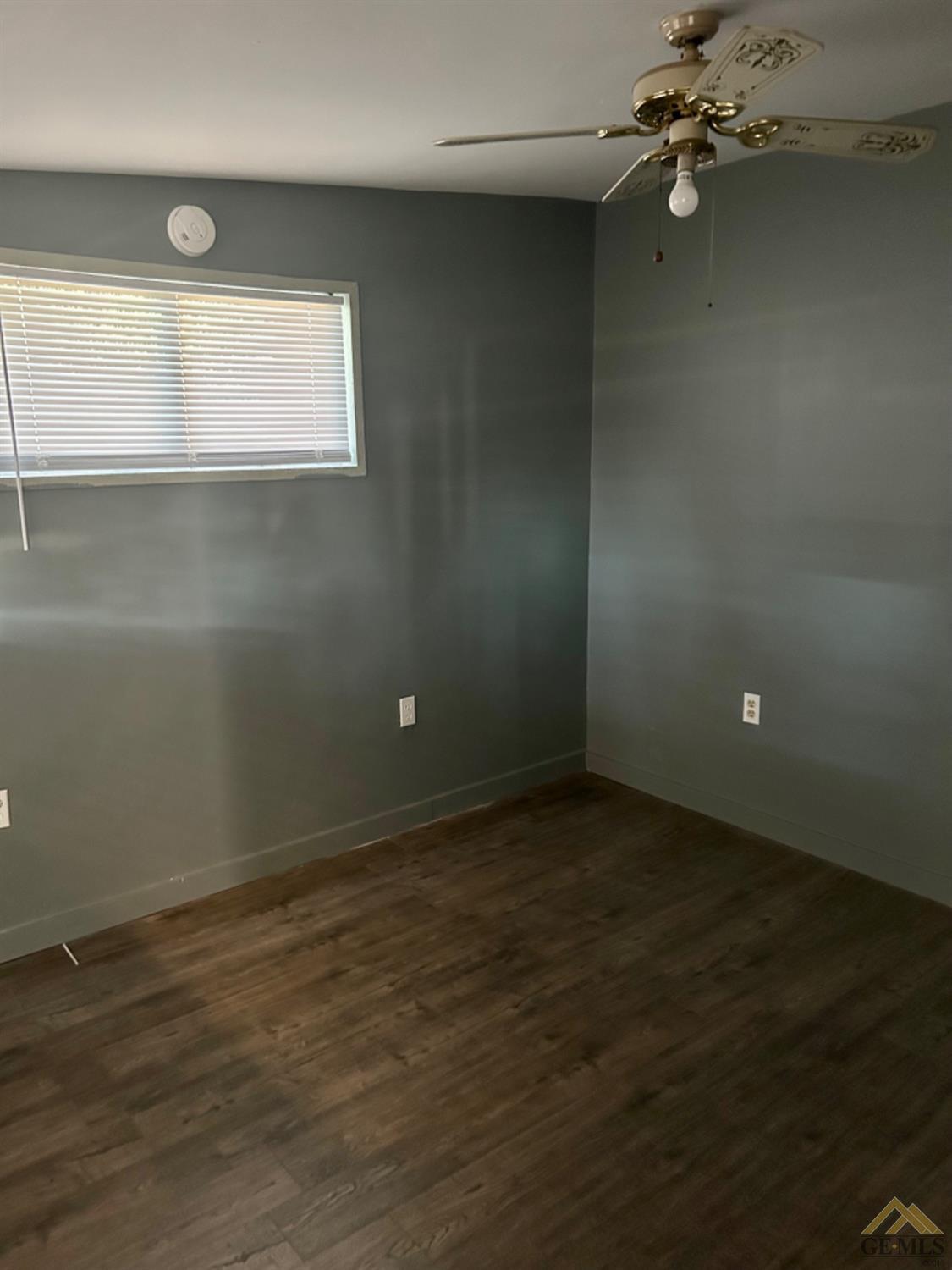 Undisclosed Address Maricopa, CA 93252 - Photo 21 of 32 an empty room with a empty space and windows