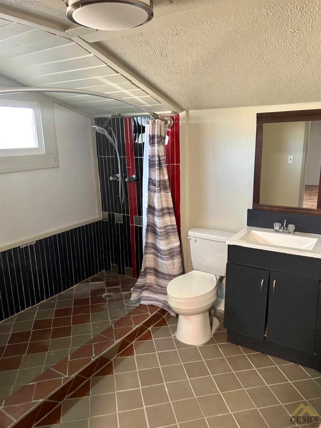 Undisclosed Address Maricopa, CA 93252 - Photo 28 of 32 a bathroom with a sink toilet and shower