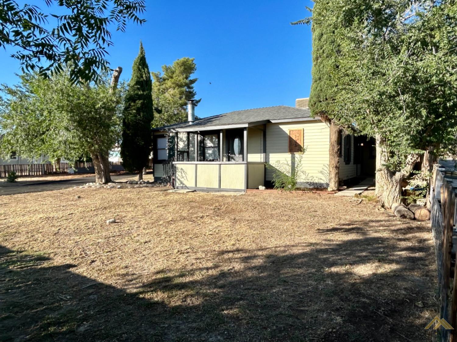 Undisclosed Address Maricopa, CA 93252 - Photo 6 of 32 a view of a house with a yard