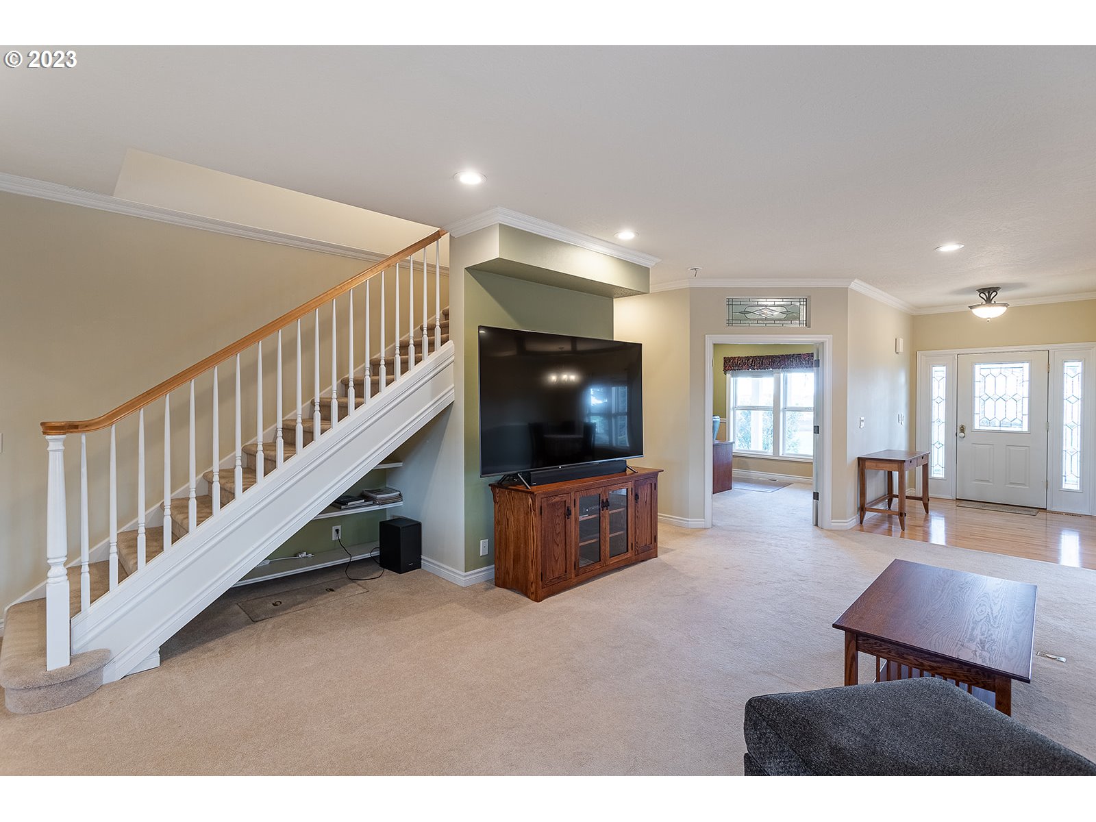 28179 High Pass Road Junction City, OR 97448 - Photo 22 of 48 a living room with furniture and a flat screen tv