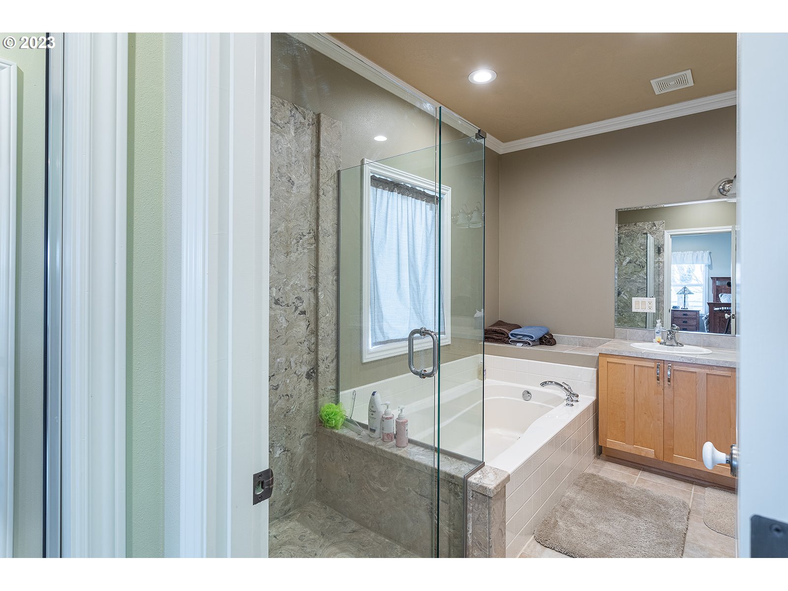 28179 High Pass Road Junction City, OR 97448 - Photo 31 of 48 a bathroom with a tub sink and mirror