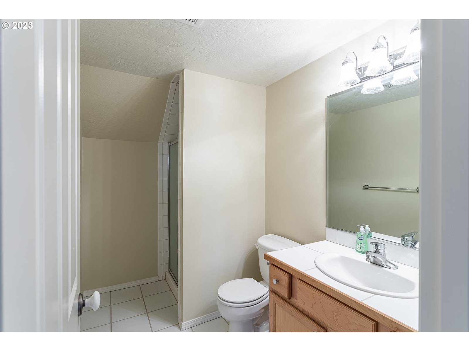 28179 High Pass Road Junction City, OR 97448 - Photo 35 of 48 a bathroom with a sink toilet and a mirror