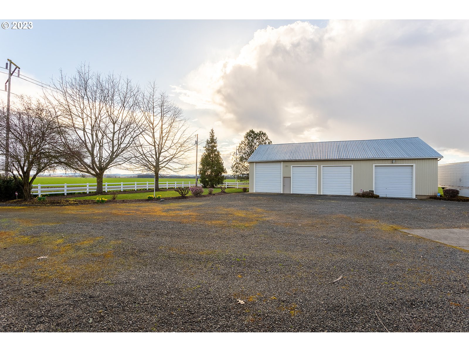 28179 High Pass Road Junction City, OR 97448 - Photo 47 of 48 a view of a house with a yard and garage