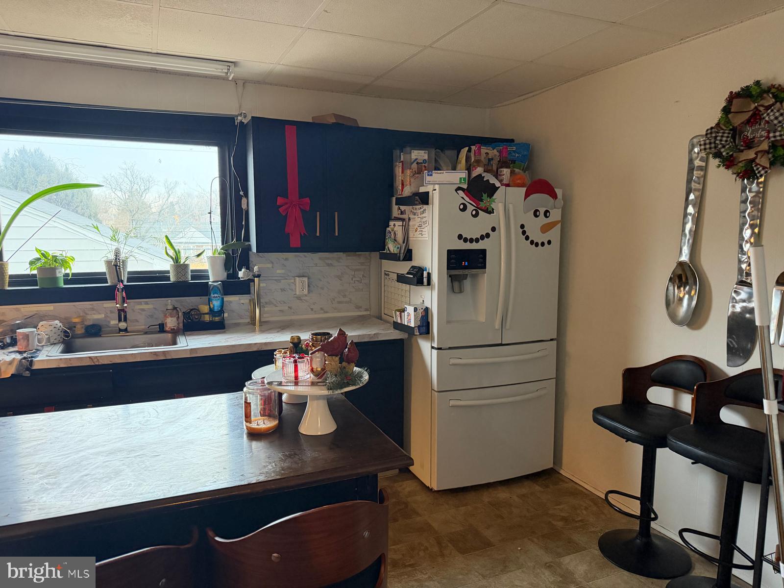 3727 6th Street Brookhaven, PA 19015 - Photo 5 of 9 a kitchen with a refrigerator and a stove