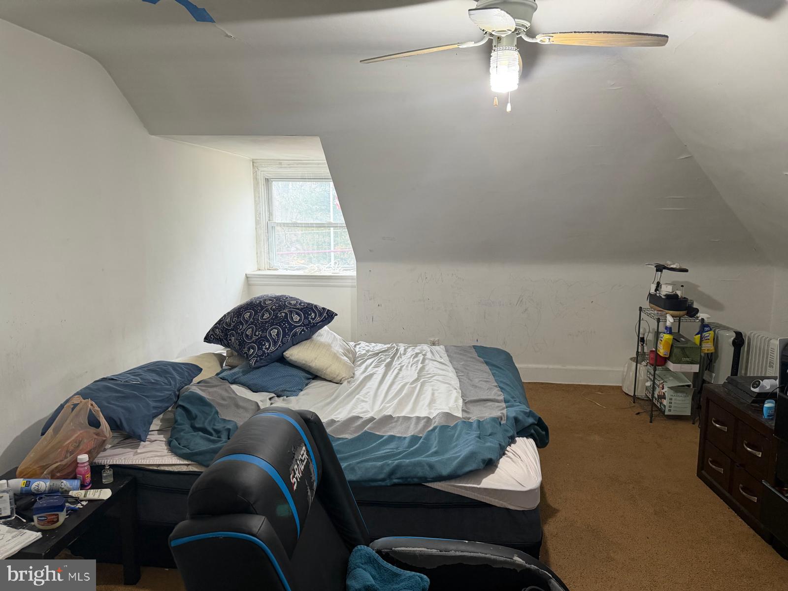 3727 6th Street Brookhaven, PA 19015 - Photo 7 of 9 a bedroom with a bed and a window