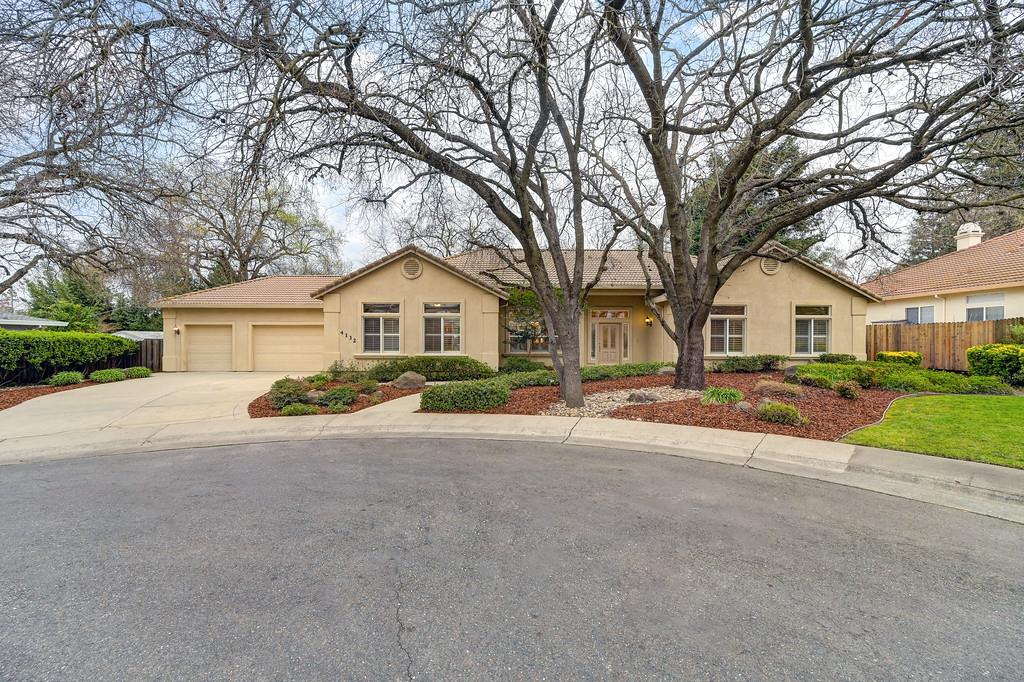 4132 Eunice Way Sacramento, CA 95821 - Photo 1 of 1 a front view of a house with a yard and garage
