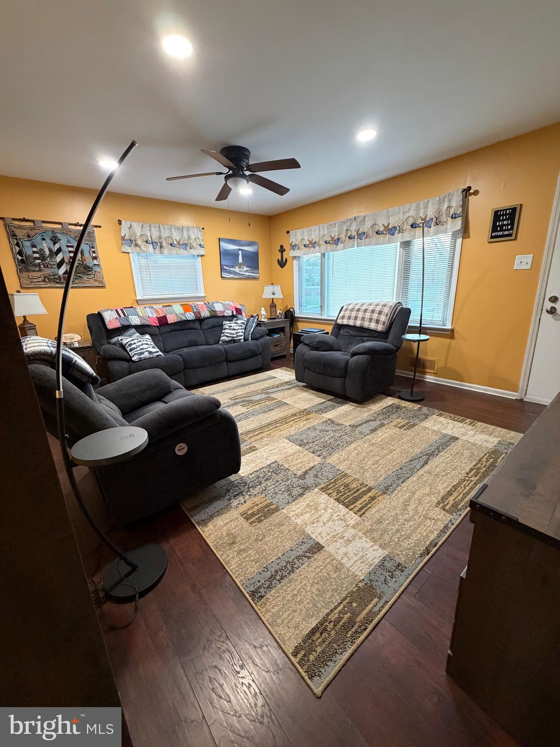 1 Nassau Road Somers Point, NJ 08244 - Photo 6 of 43 a living room with furniture and a flat screen tv