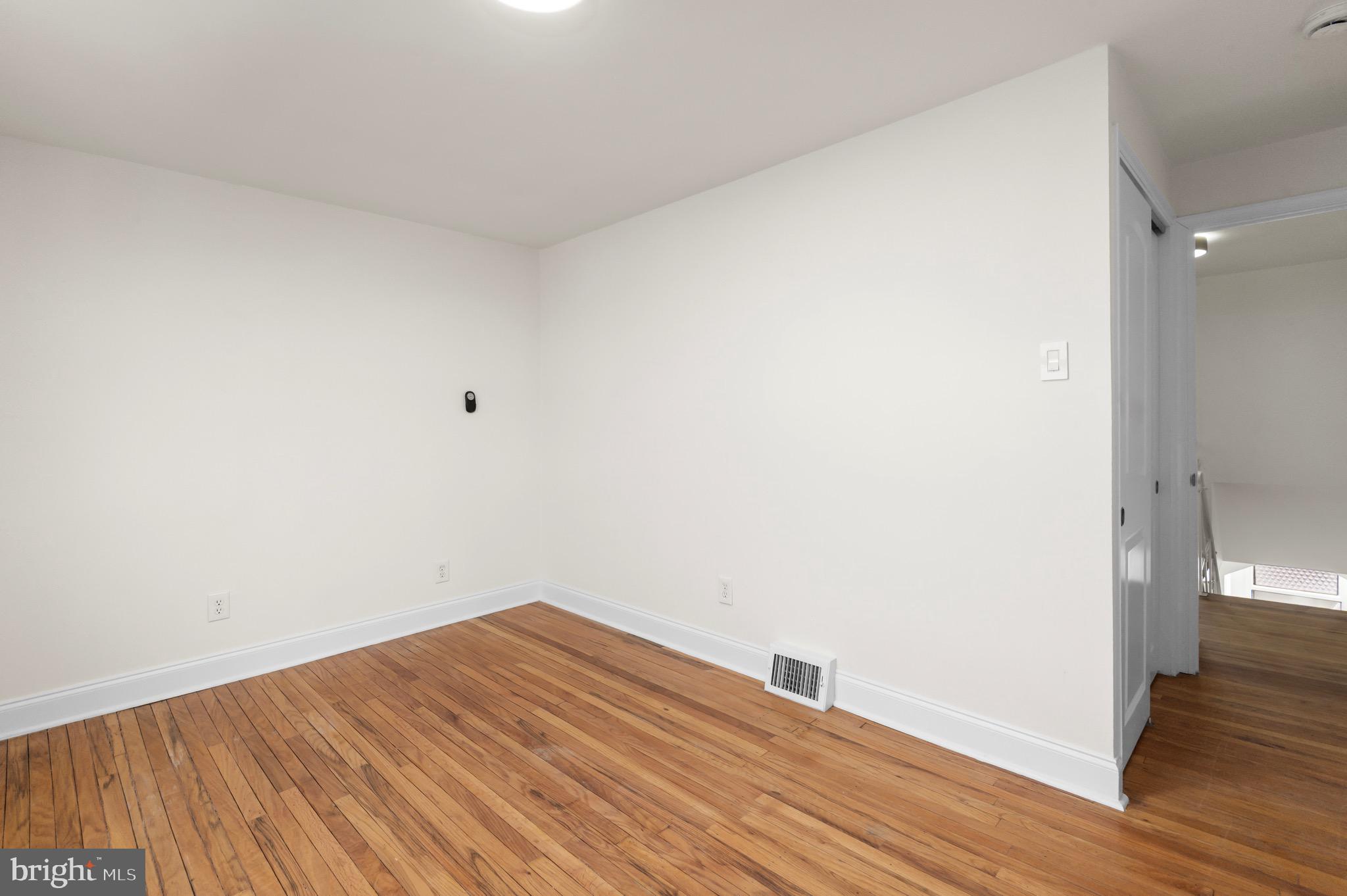 10867 Harrow Road Philadelphia, PA 19154 - Photo 12 of 19 a view of empty room with wooden floor