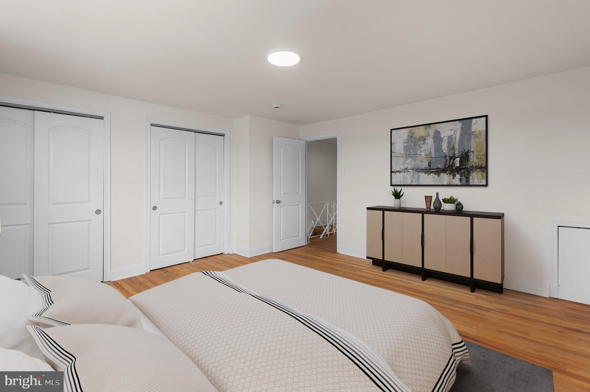 10867 Harrow Road Philadelphia, PA 19154 - Photo 13 of 19 a bedroom with a large bed and a desk