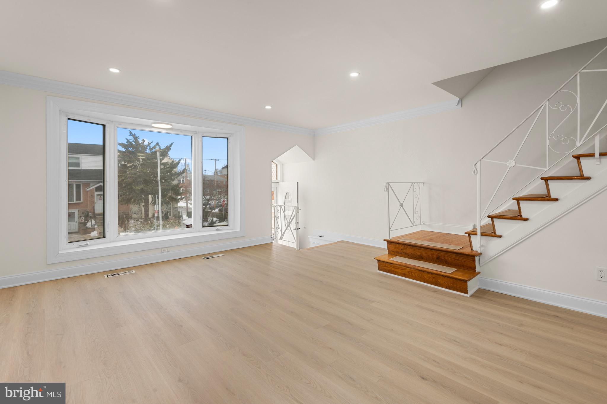 10867 Harrow Road Philadelphia, PA 19154 - Photo 3 of 19 a view of a room with stairs and wooden floor