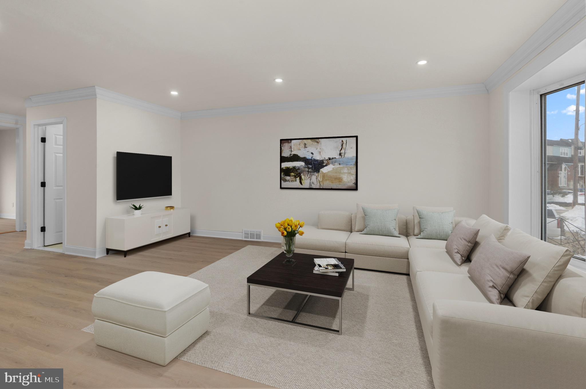 10867 Harrow Road Philadelphia, PA 19154 - Photo 4 of 19 a living room with furniture and a flat screen tv