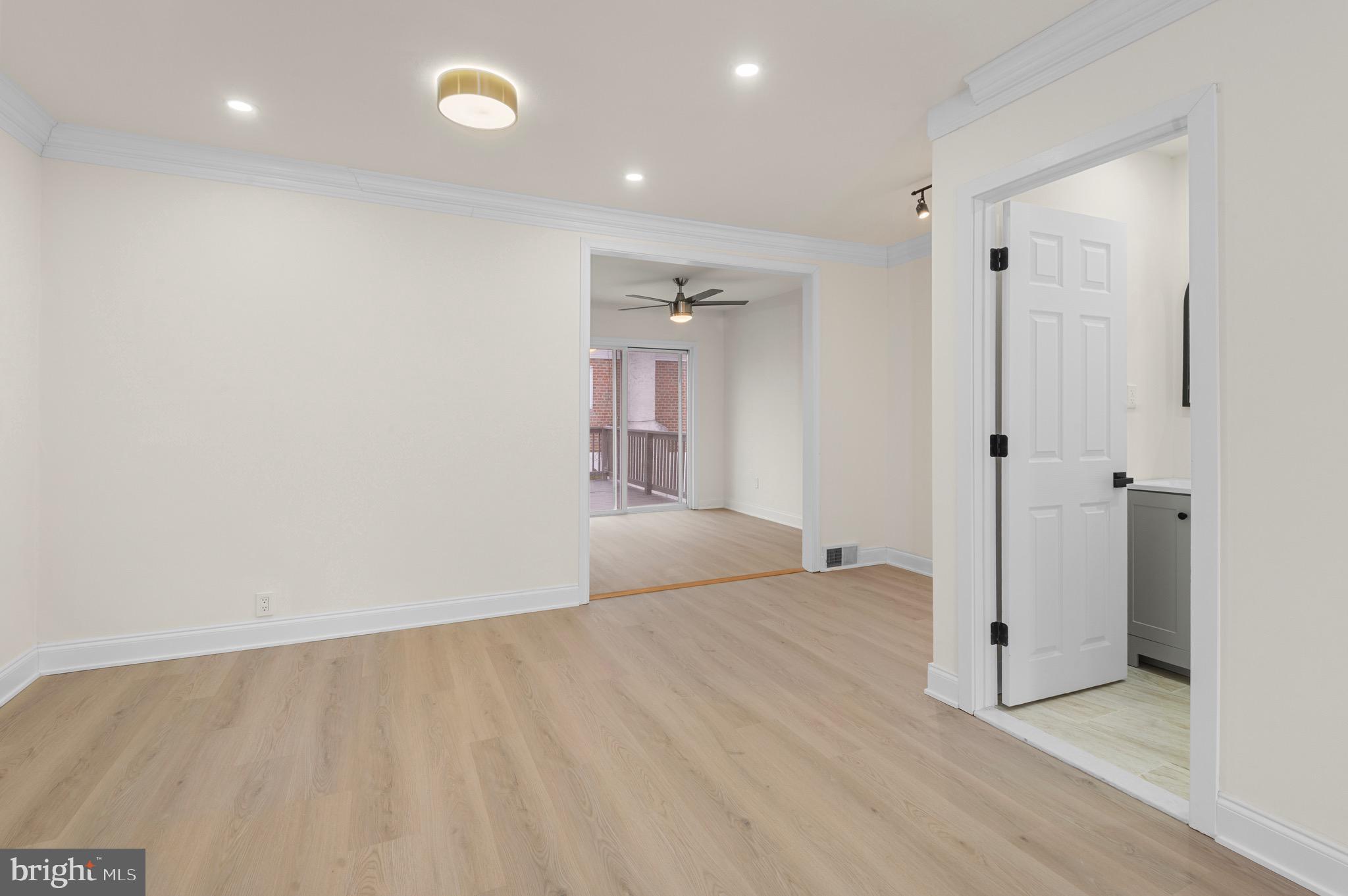 10867 Harrow Road Philadelphia, PA 19154 - Photo 5 of 19 wooden floor in an empty room with a window