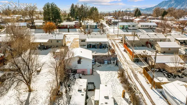 a view of a terrace with wooden walls