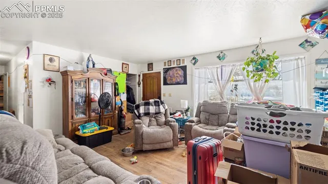 a living room with furniture and a rug