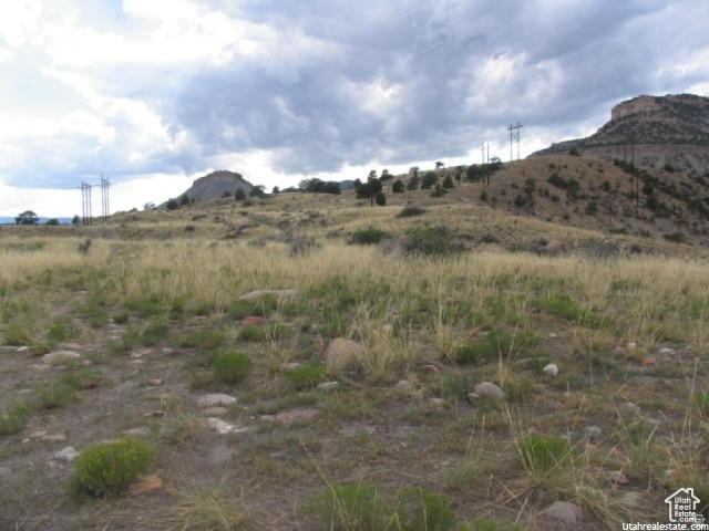 700 Spring Canyon Road Helper, UT 84526 - Photo 12 of 19 Expansive natural landscape featuring rolling hills and distant elevated terrain