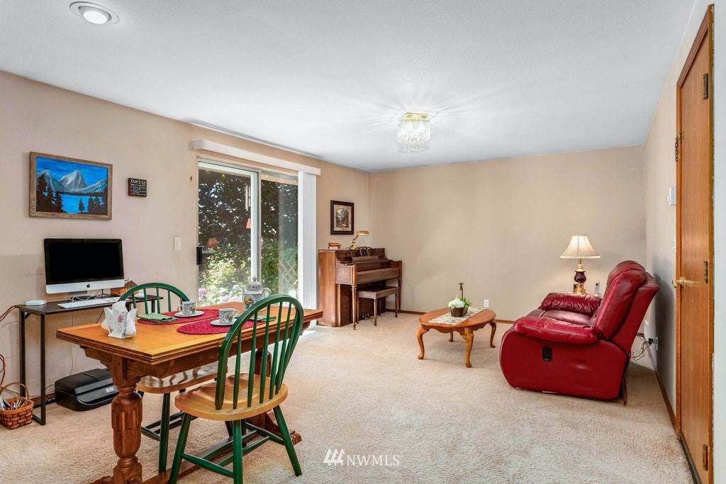 22915 13th Place West Bothell, WA 98021 - Photo 14 of 28 a workspace with furniture and tables
