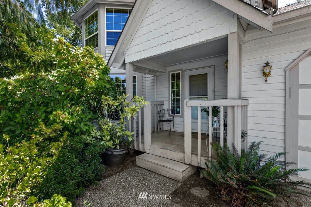 22915 13th Place West Bothell, WA 98021 - Photo 3 of 28 a view of potted plants in front of door