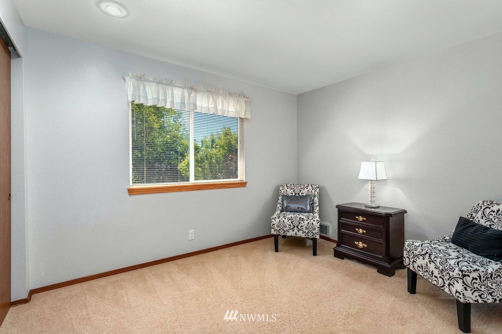 22915 13th Place West Bothell, WA 98021 - Photo 21 of 28 a living room with furniture and a window