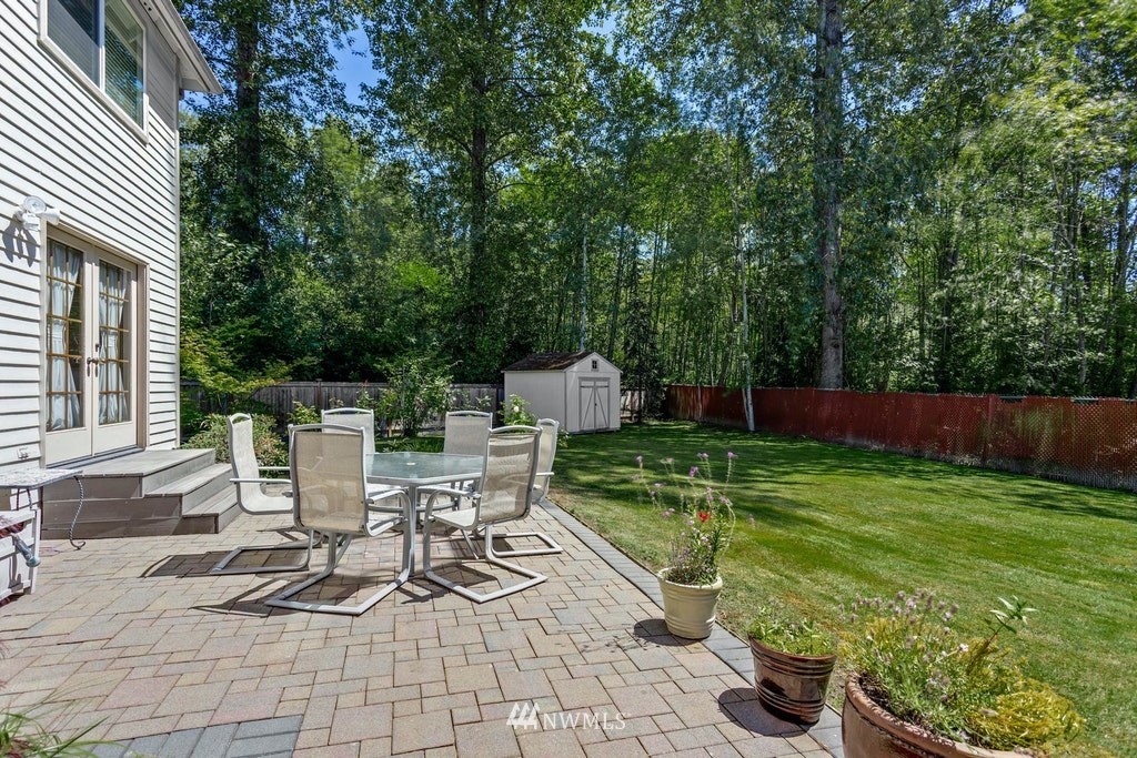22915 13th Place West Bothell, WA 98021 - Photo 26 of 28 a view of backyard with seating and green space