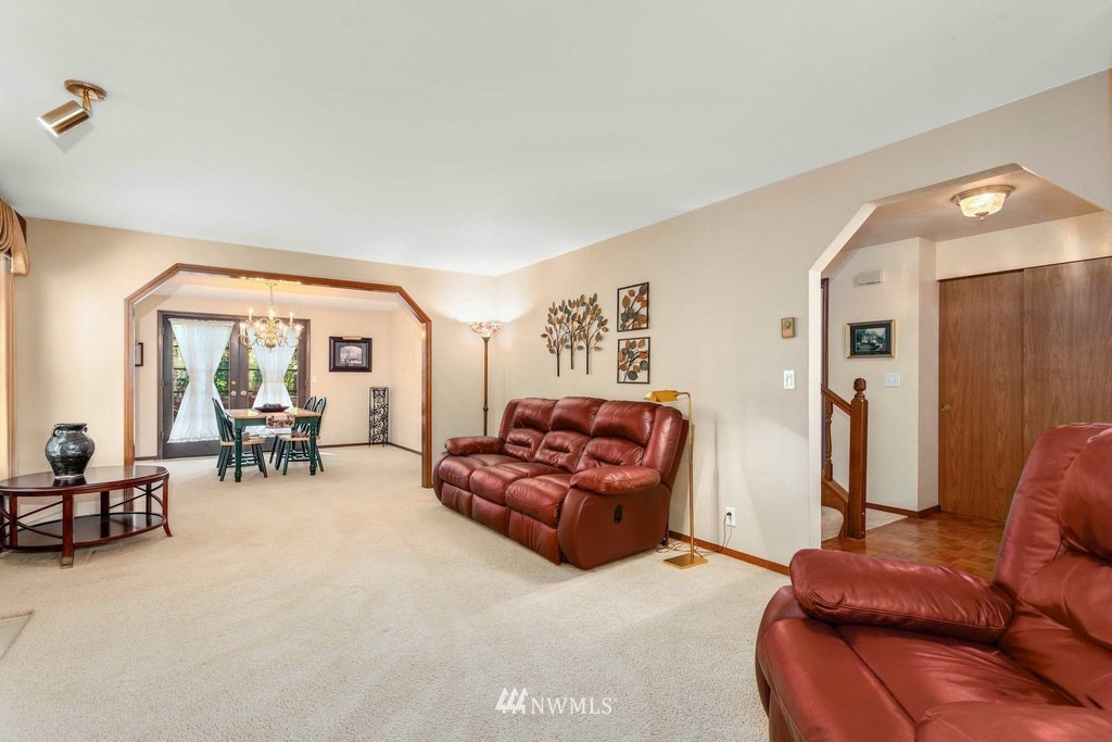 22915 13th Place West Bothell, WA 98021 - Photo 6 of 28 a living room with furniture and a large window