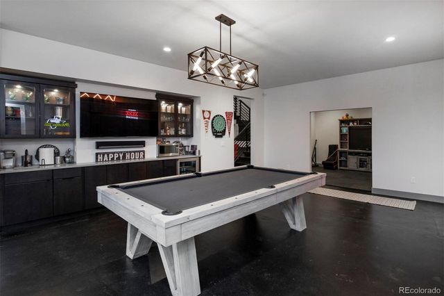 a living room with fireplace furniture and a flat screen tv