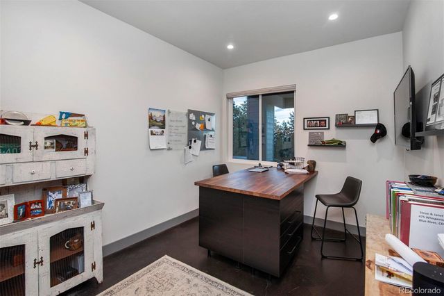 a room with furniture and a flat screen tv