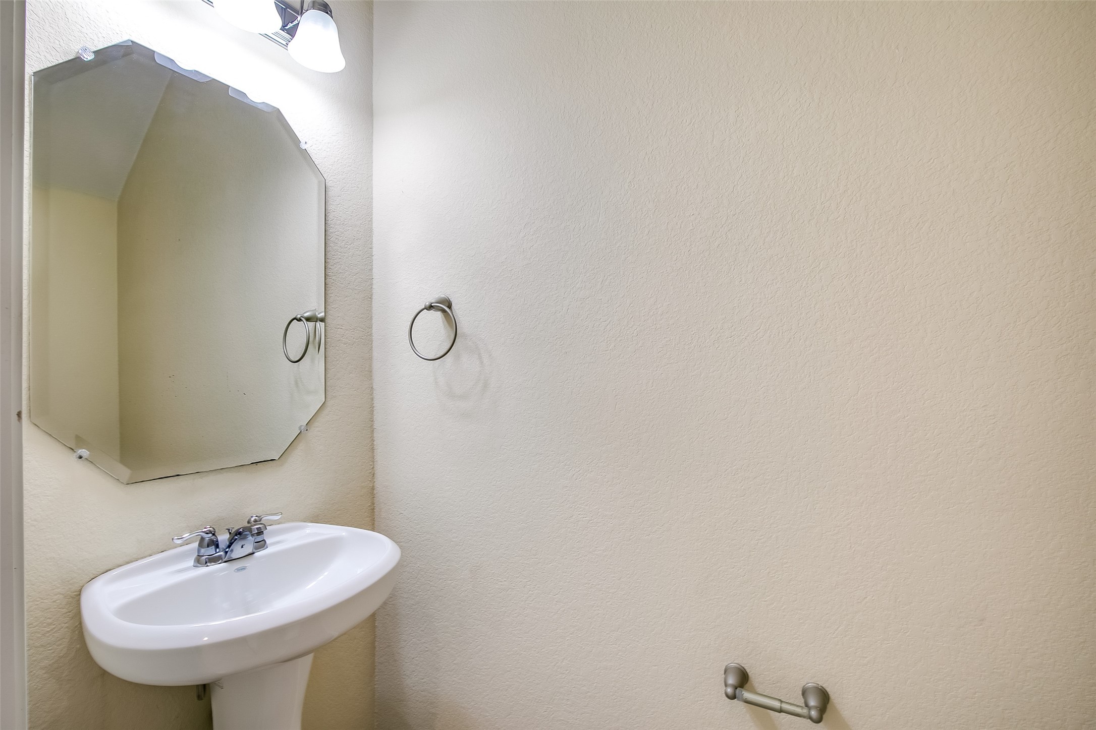 3717 Dover Ferry Crossing Austin, TX 78728 - Photo 14 of 29 a bathroom with a sink and a mirror