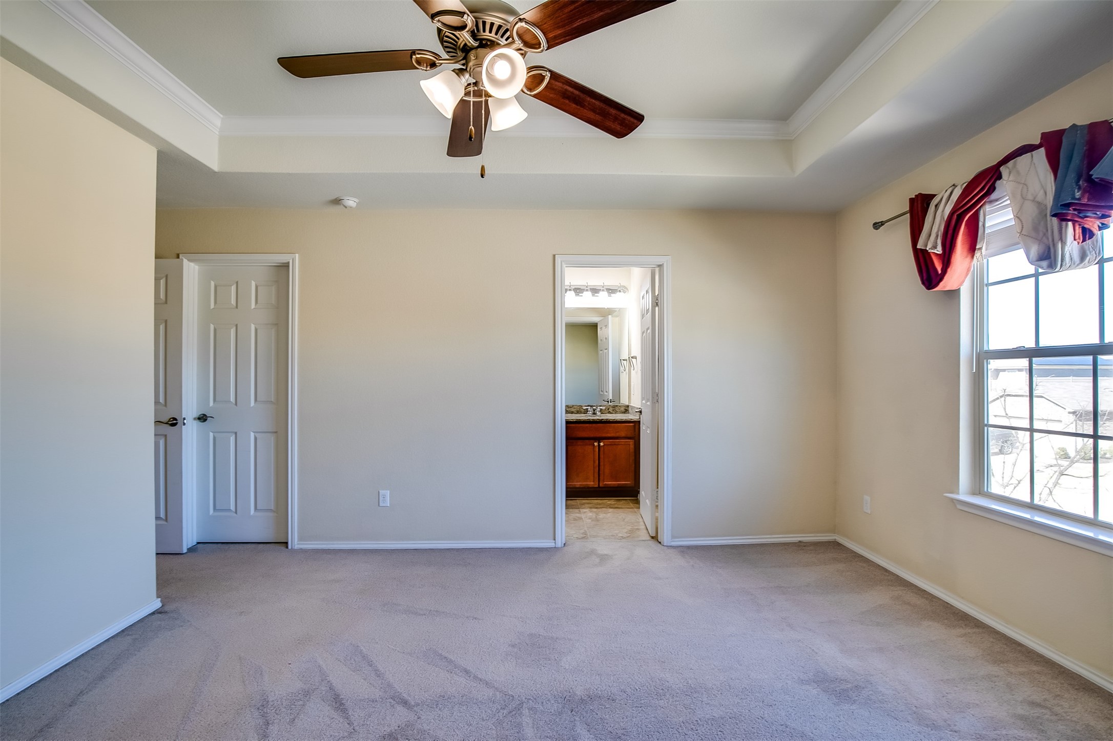3717 Dover Ferry Crossing Austin, TX 78728 - Photo 17 of 29 an empty room with windows and fan