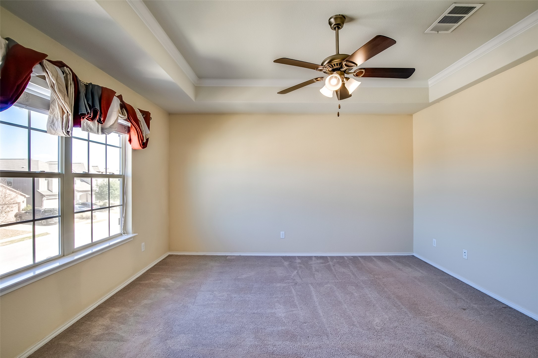 3717 Dover Ferry Crossing Austin, TX 78728 - Photo 18 of 29 an empty room with windows and fan