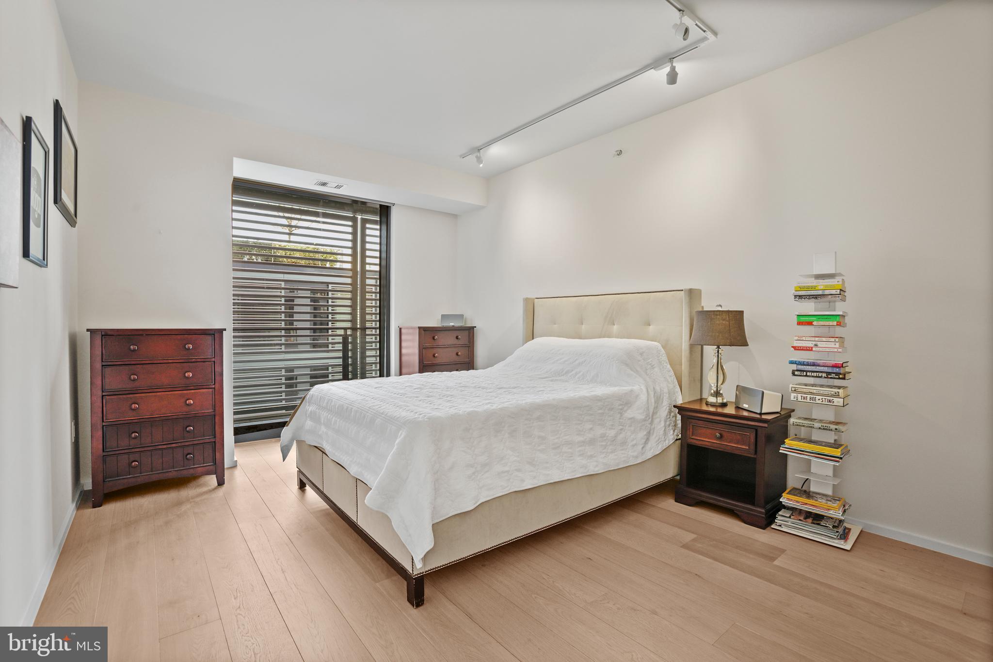 925 H Street Northwest, Unit 712 Washington, DC 20001 - Photo 20 of 54 a bedroom with a bed and a closet