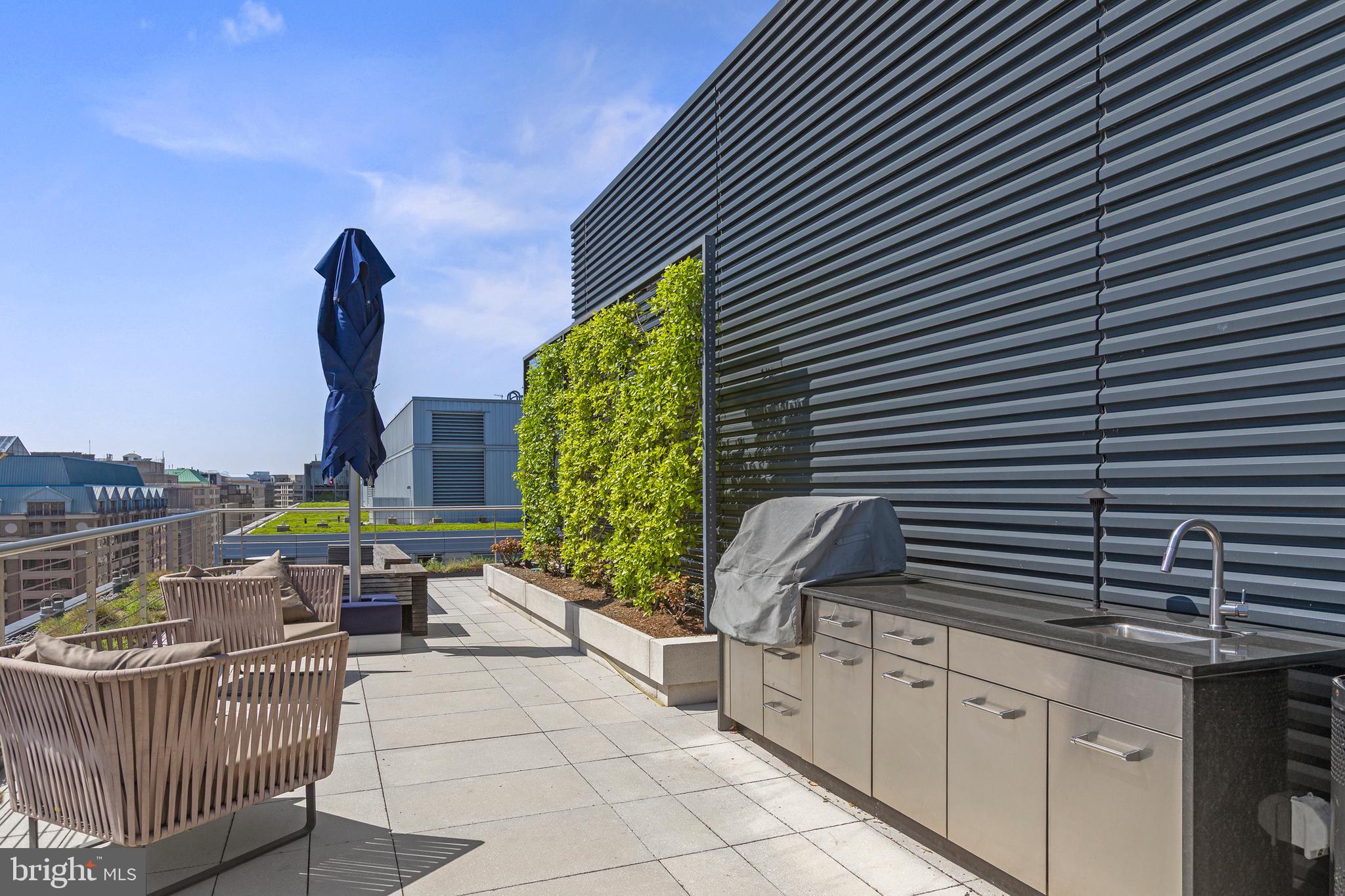 925 H Street Northwest, Unit 712 Washington, DC 20001 - Photo 33 of 54 a outdoor view with a sitting space