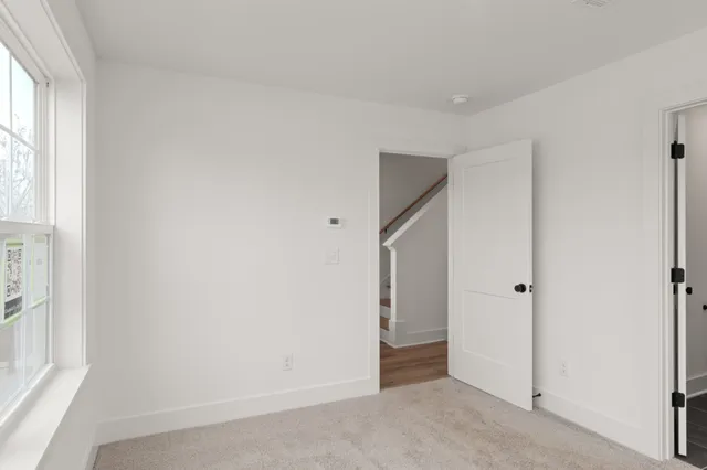 an empty room with windows