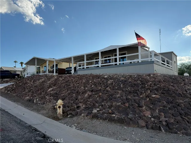 a house view with a backyard space