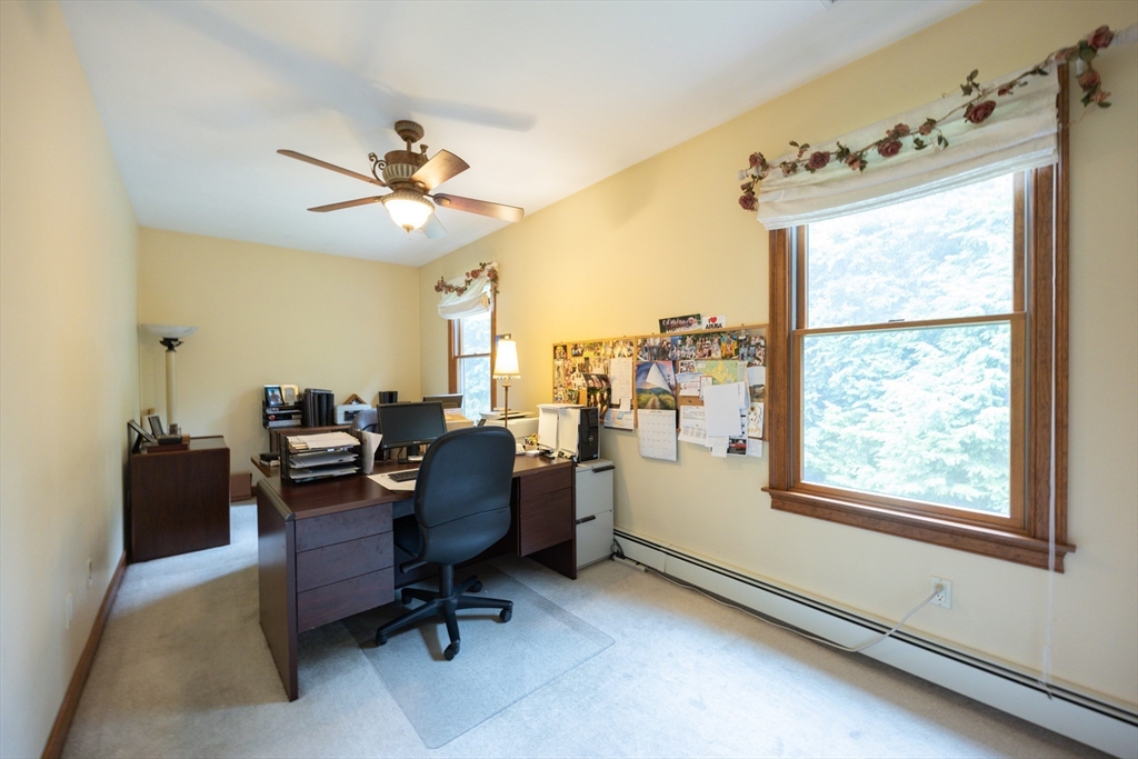 70 Azalea Way Hanson, MA 02341 - Photo 26 of 42 a view of a workspace with furniture and a window
