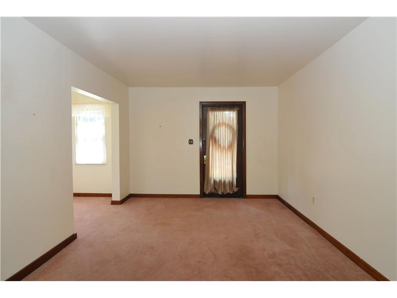 3255 Brodhead Road Aliquippa, PA 15001 - Photo 4 of 8 Living Room. Large living room with a great sunroom for additional space!