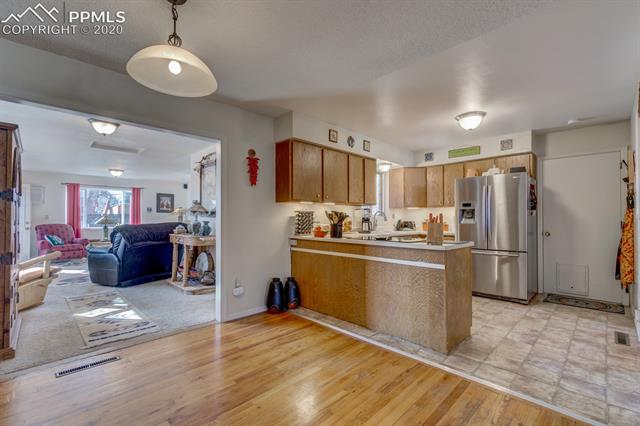 1208 Wooten Road Colorado Springs, CO 80915 - Photo 6 of 39 Gallery Image 6