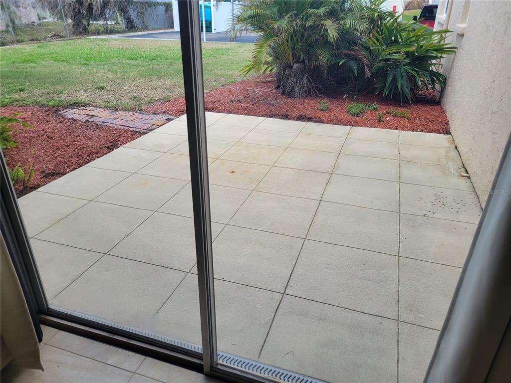 10032 65th Avenue North, Unit 8 St. Petersburg, FL 33708 - Photo 53 of 61 a view of a backyard space of the house