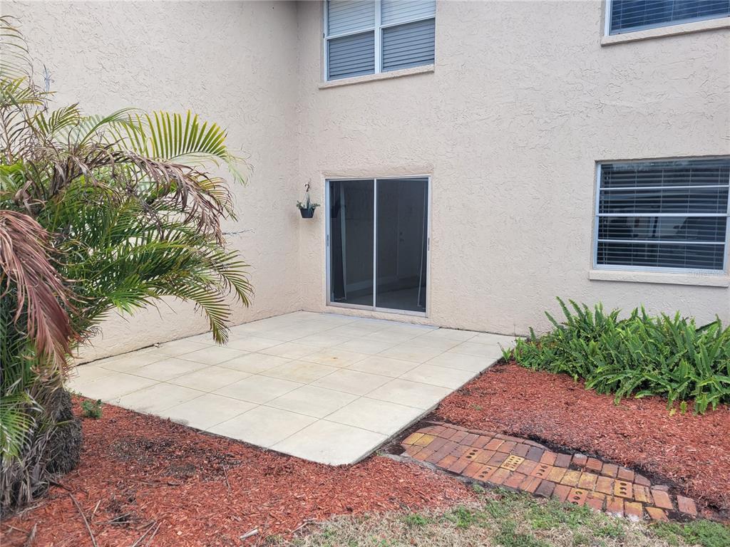 10032 65th Avenue North, Unit 8 St. Petersburg, FL 33708 - Photo 57 of 61 a house with a outdoor space