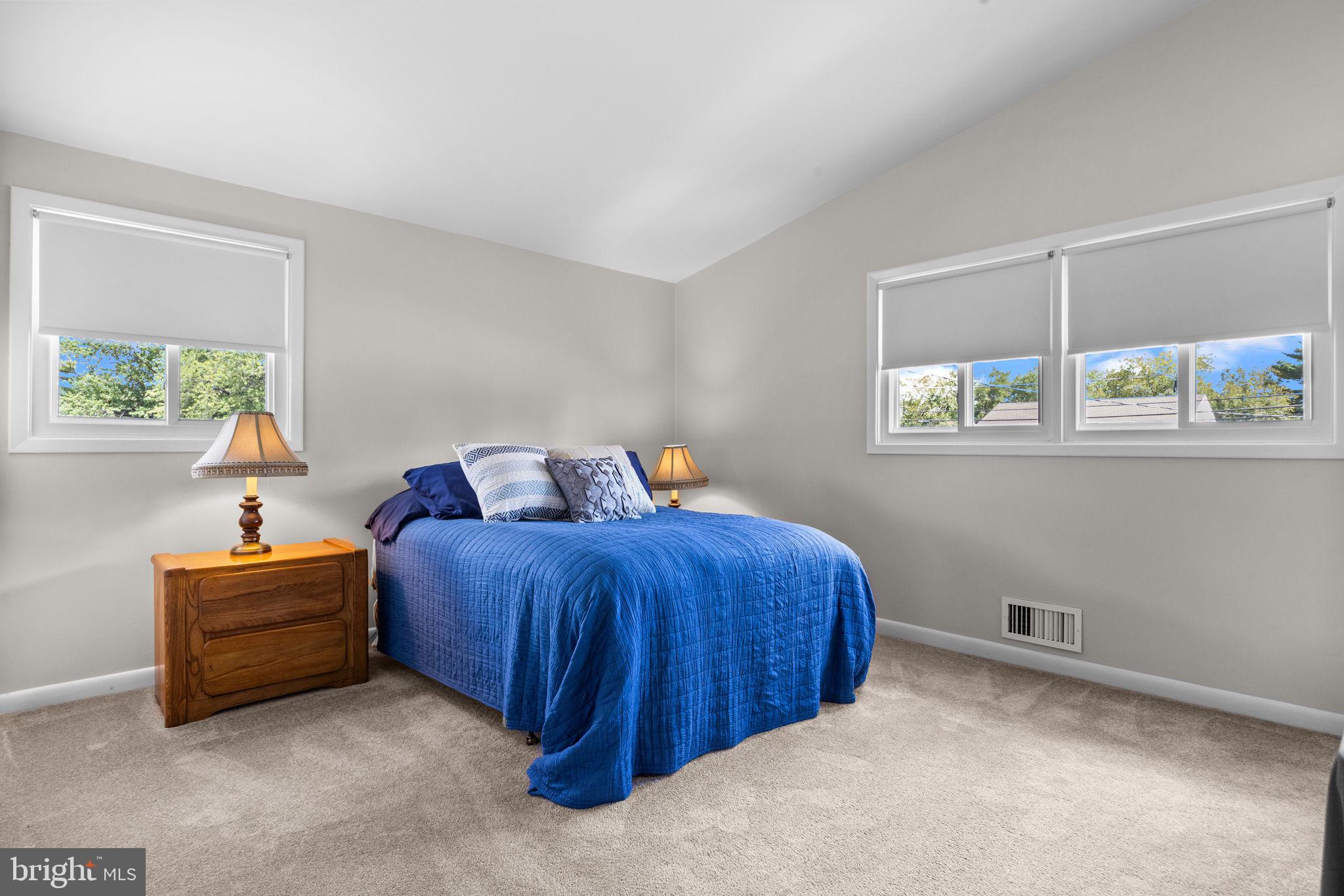 3166 Hulmeville Road Bensalem, PA 19020 - Photo 16 of 40 a bedroom with bed and window