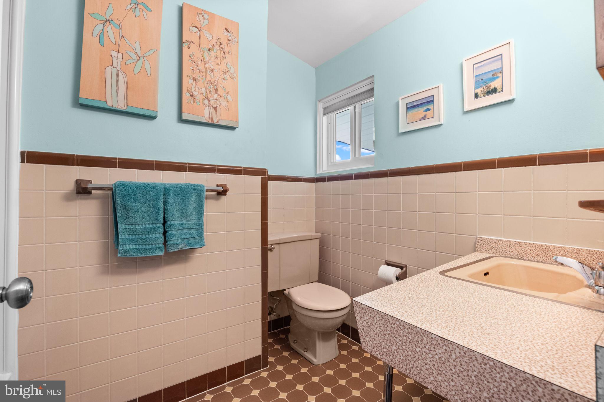3166 Hulmeville Road Bensalem, PA 19020 - Photo 19 of 40 a bathroom with a sink toilet and mirror