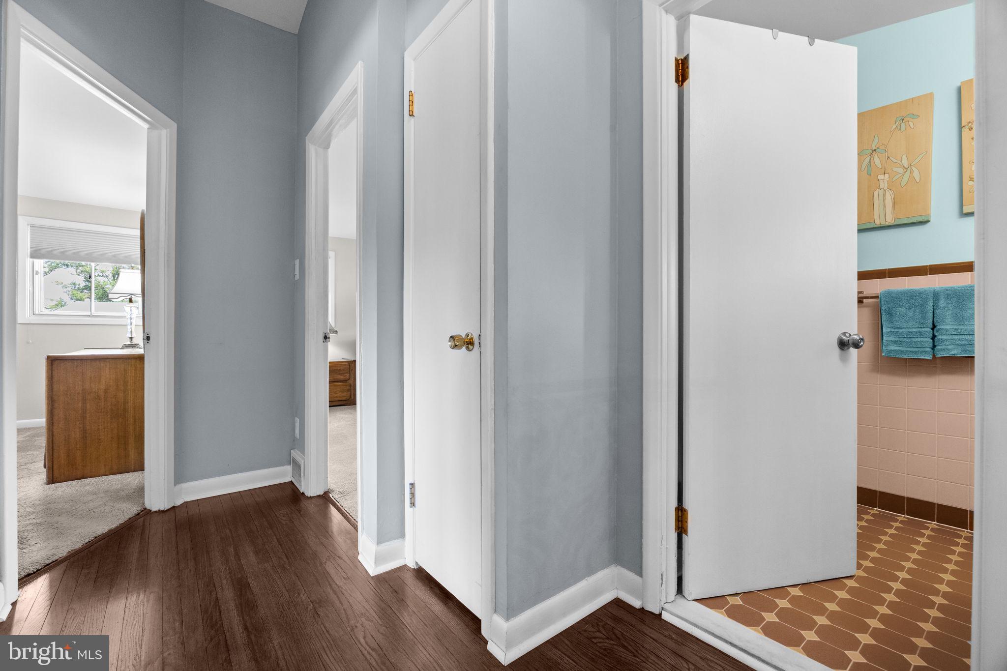 3166 Hulmeville Road Bensalem, PA 19020 - Photo 21 of 40 a view of a hallway with wooden floor