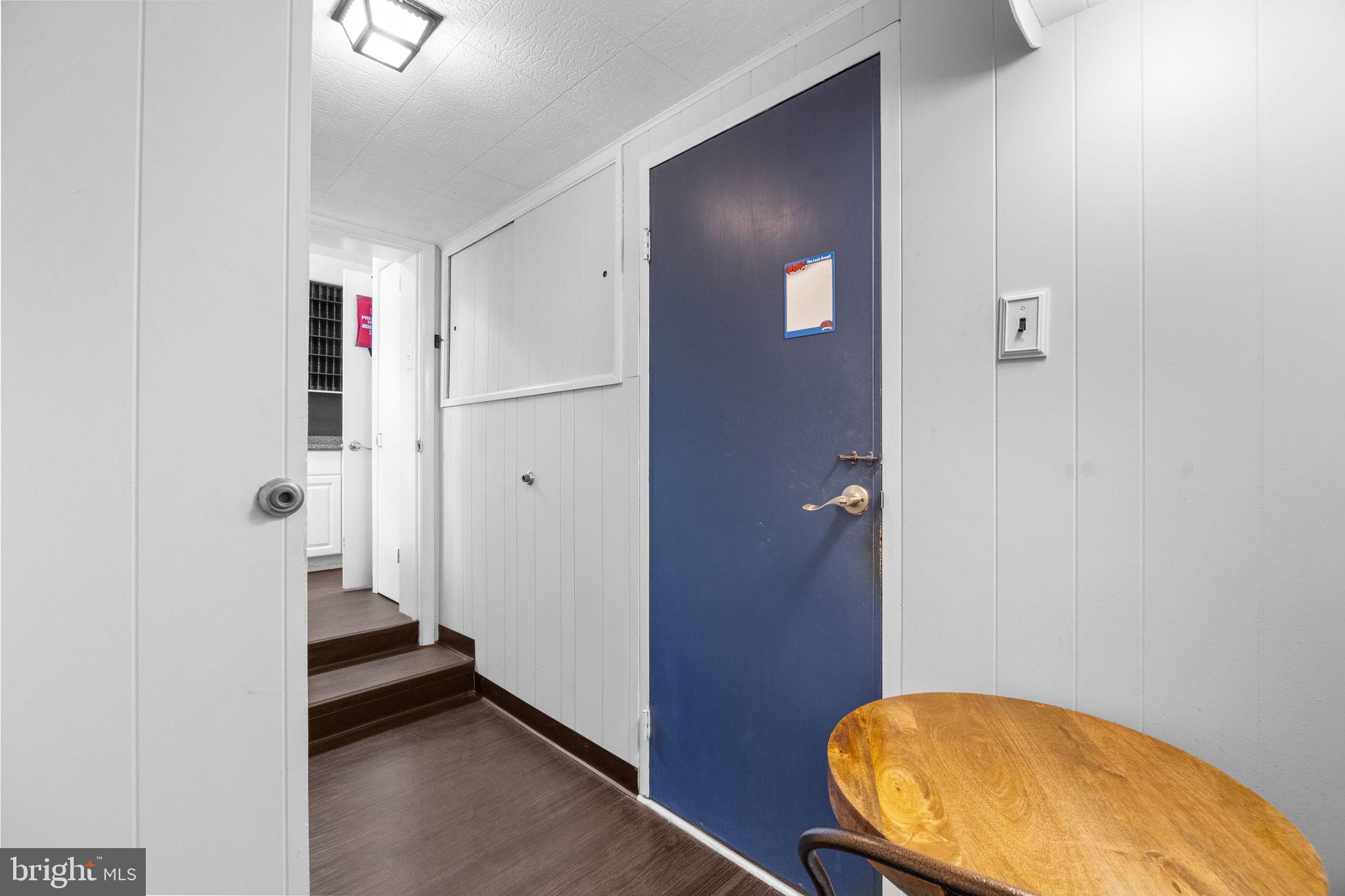 3166 Hulmeville Road Bensalem, PA 19020 - Photo 26 of 40 a view of a hallway with wooden floor and bathroom
