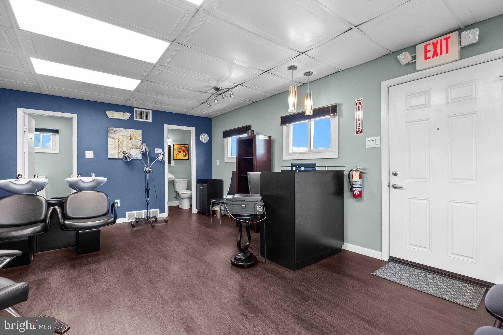 3166 Hulmeville Road Bensalem, PA 19020 - Photo 29 of 40 a view of a livingroom with workspace and a couch
