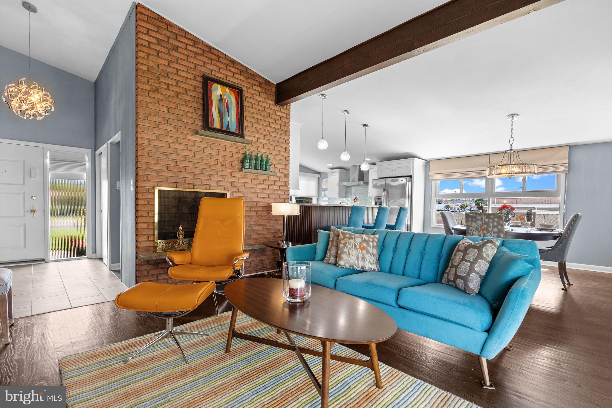 3166 Hulmeville Road Bensalem, PA 19020 - Photo 3 of 40 a living room with furniture and a fireplace