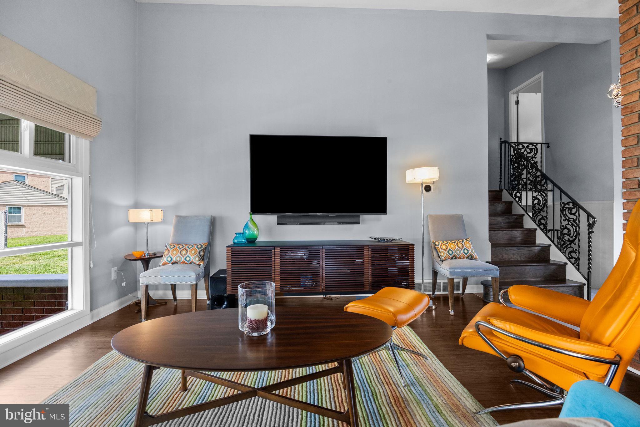 3166 Hulmeville Road Bensalem, PA 19020 - Photo 5 of 40 a living room with furniture and a flat screen tv