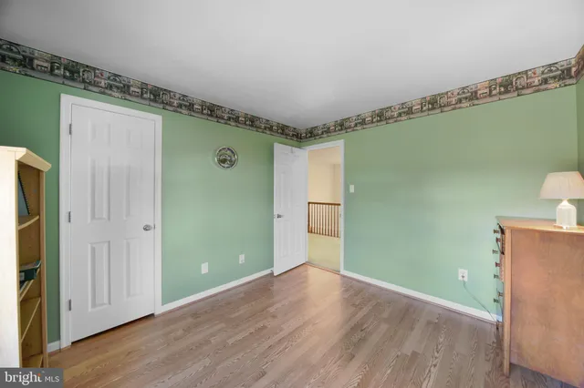 a view of a patio with table and chairs