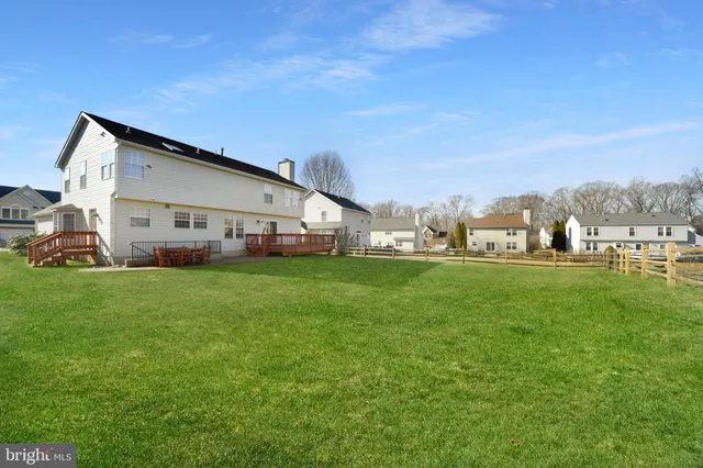 a view of a house with a big yard